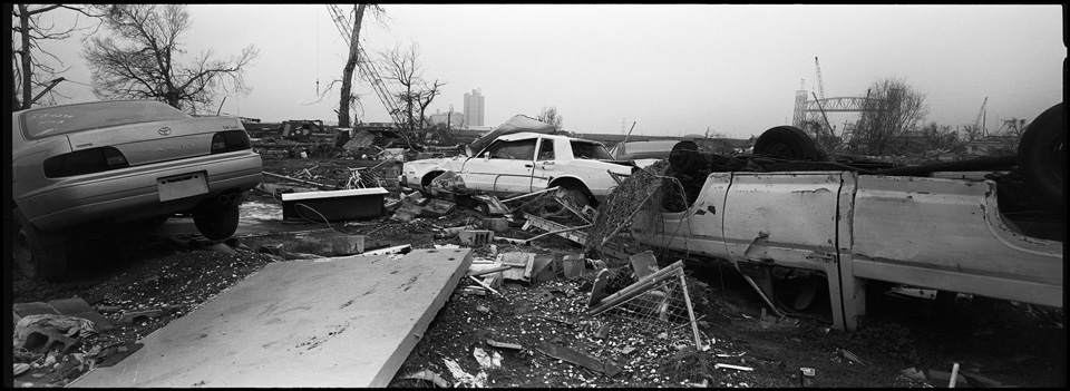 lower 9th ward after hurricane katrina - panoramic of destroyed cars
