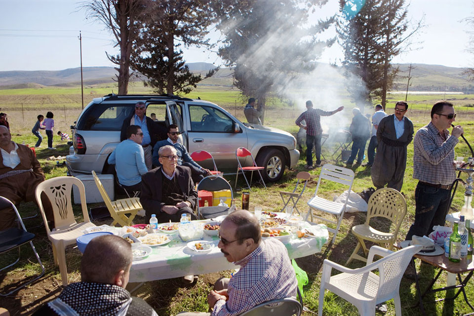 The Ahmed family from Sulaimani enjoys a picnic on the day after Newroz, the Kurdish new year. Many of the family's members emigrated to Canada, the United States, and Germany for safety and opportunity 20 years ago; today, many emigrants are returning to their homeland to open businesses, get in touch with long lost family, or just finally come home.