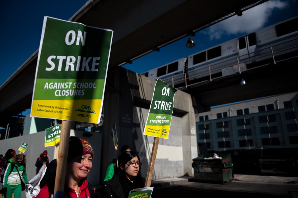 Teachers from Roots International Academy in Oakland, Calif., walked together to the subway on the first day of a district-wide teachers strike, before traveling to a rally downtown.