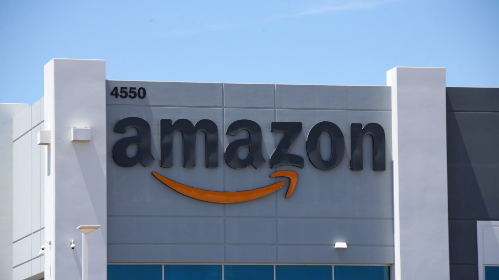 A gray building with the Amazon logo on it