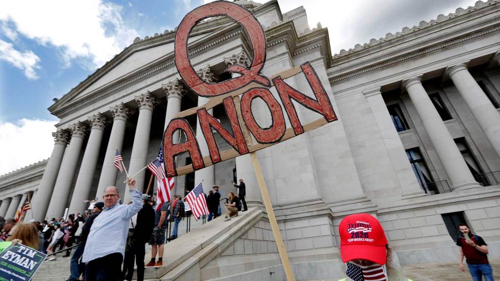 A QAnon and Trump supporter at a protest