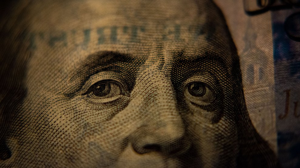 A closeup of a US hundred dollar bill (Benjamin Franklin side).