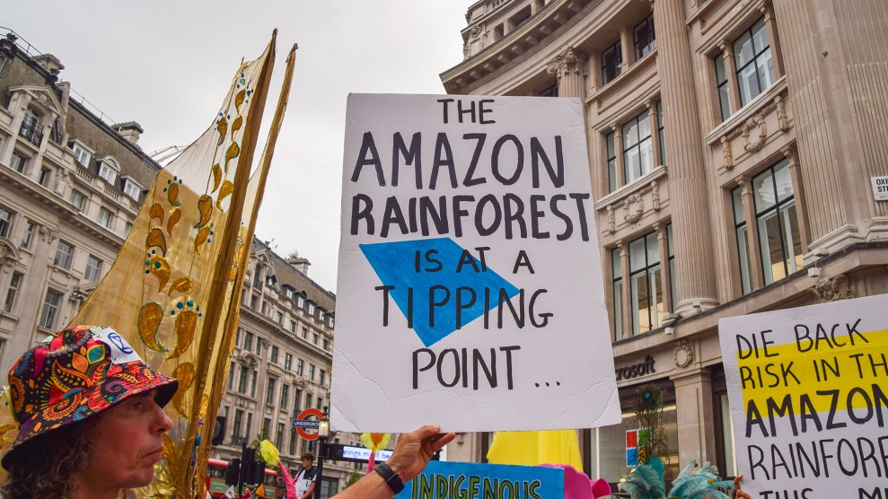 A sign that says "The Amazon Rainforest is a tipping point"