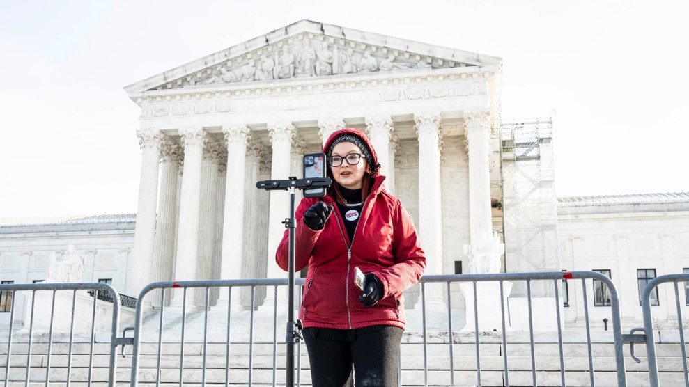 A TikTok supporter speaking in front of the Supreme Court