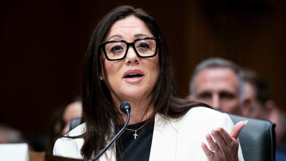 Lori Chavez-DeRemer sitting in a chair, faced forward, and speaking to senators at her confirmation hearing.