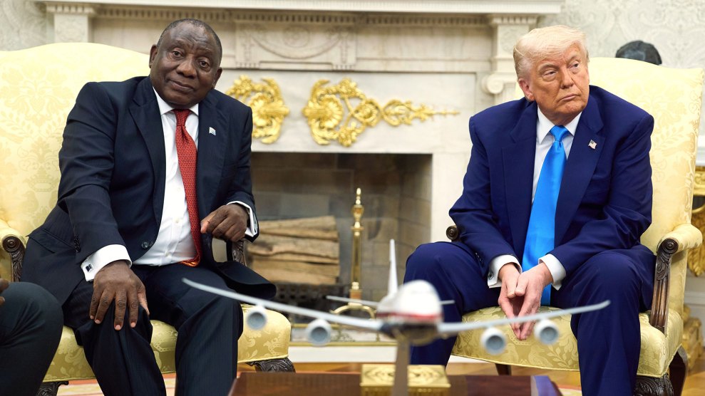 Donald Trump and Cyril Ramaphosa sit in the Oval Office.