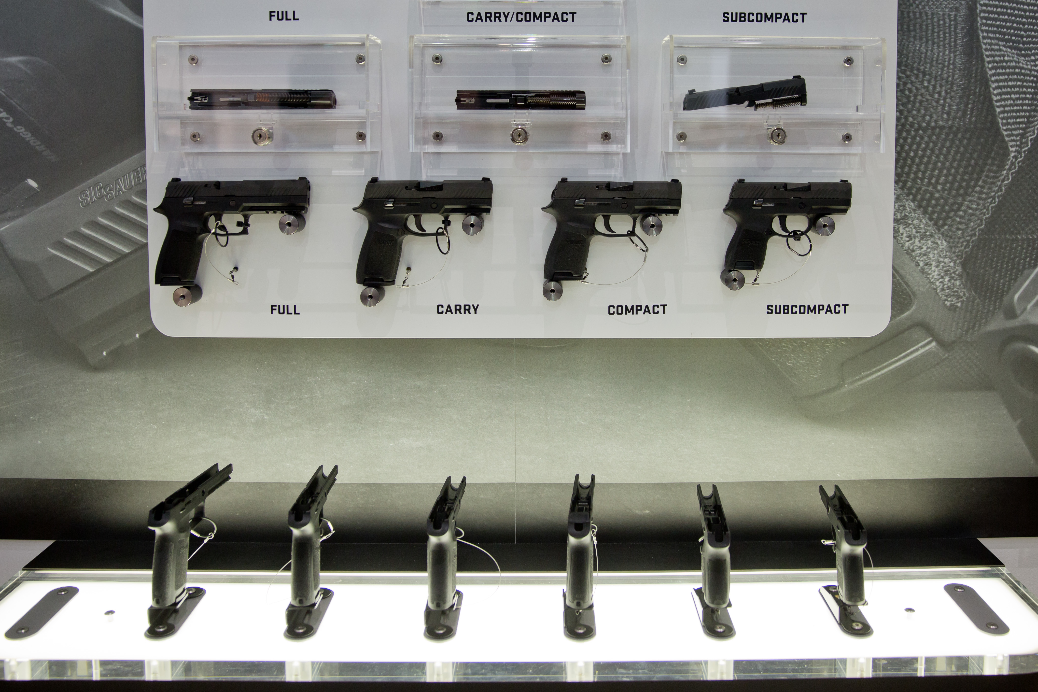 Array of handguns on display.