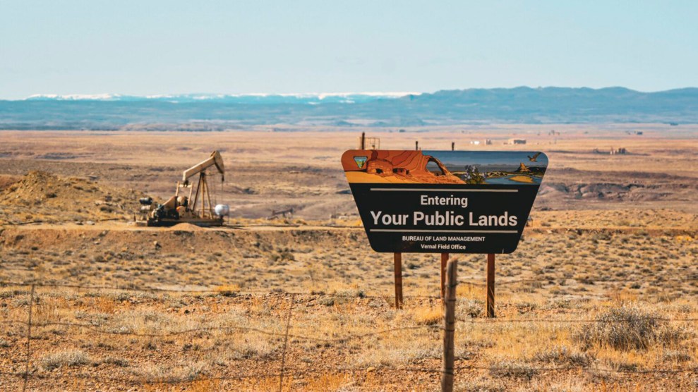 A desert with a sign that say "Entering Your Public Lands"