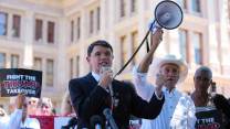 Texas Rep. James Talarico speaking outside the Texas state house.