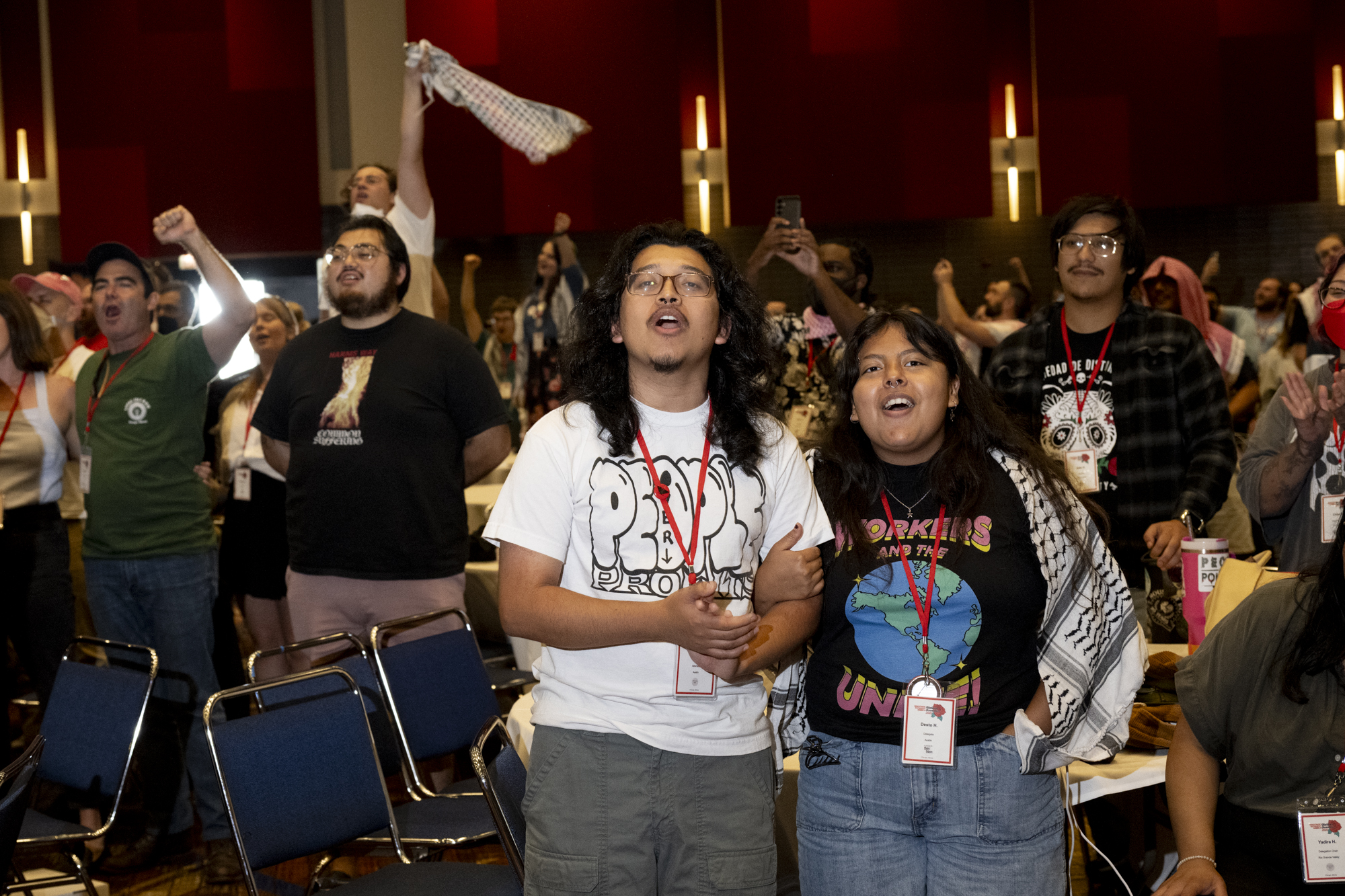 Group of young people singing.