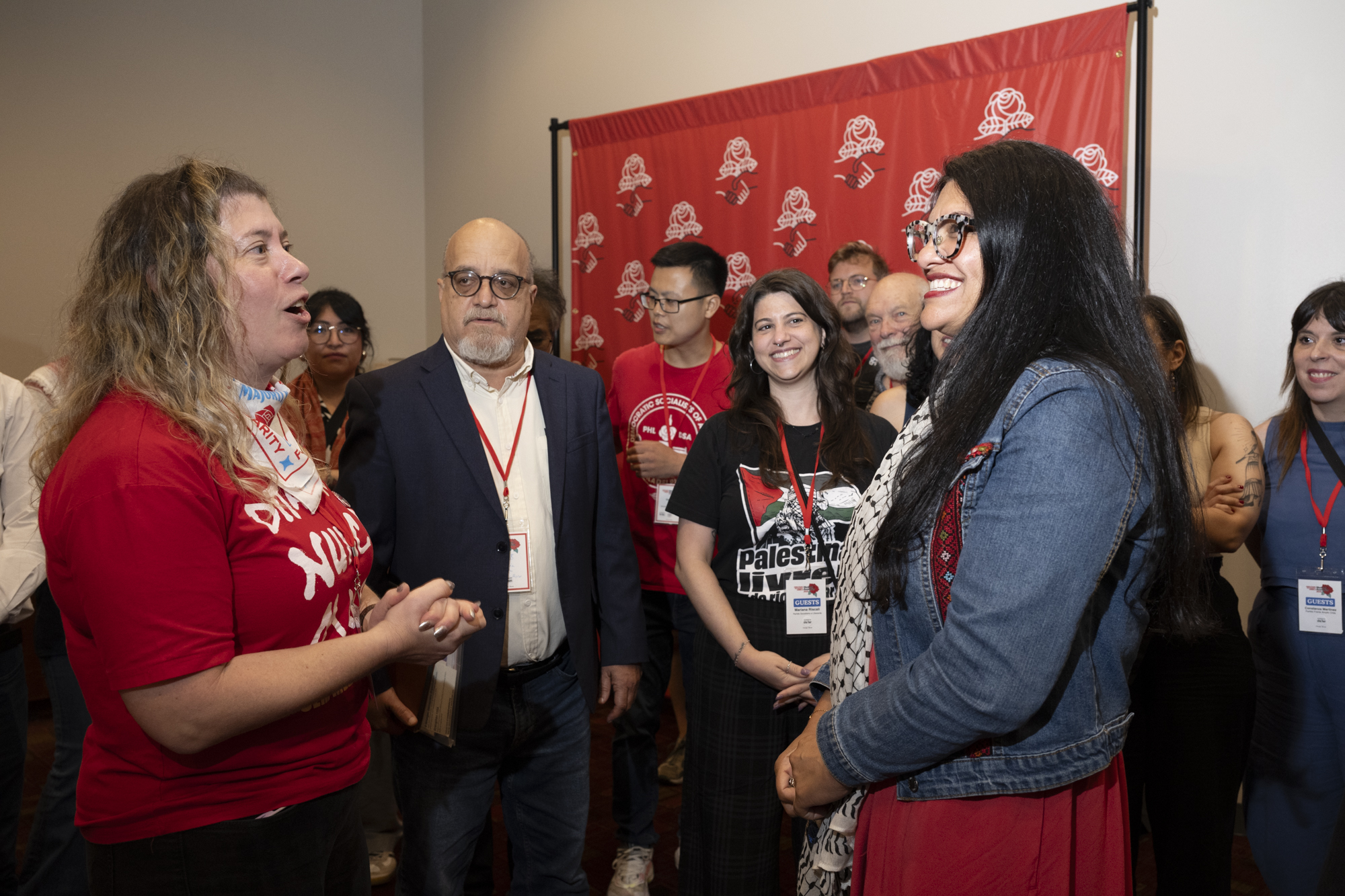 Person talking to Congresswoman Rashida Tlaib.