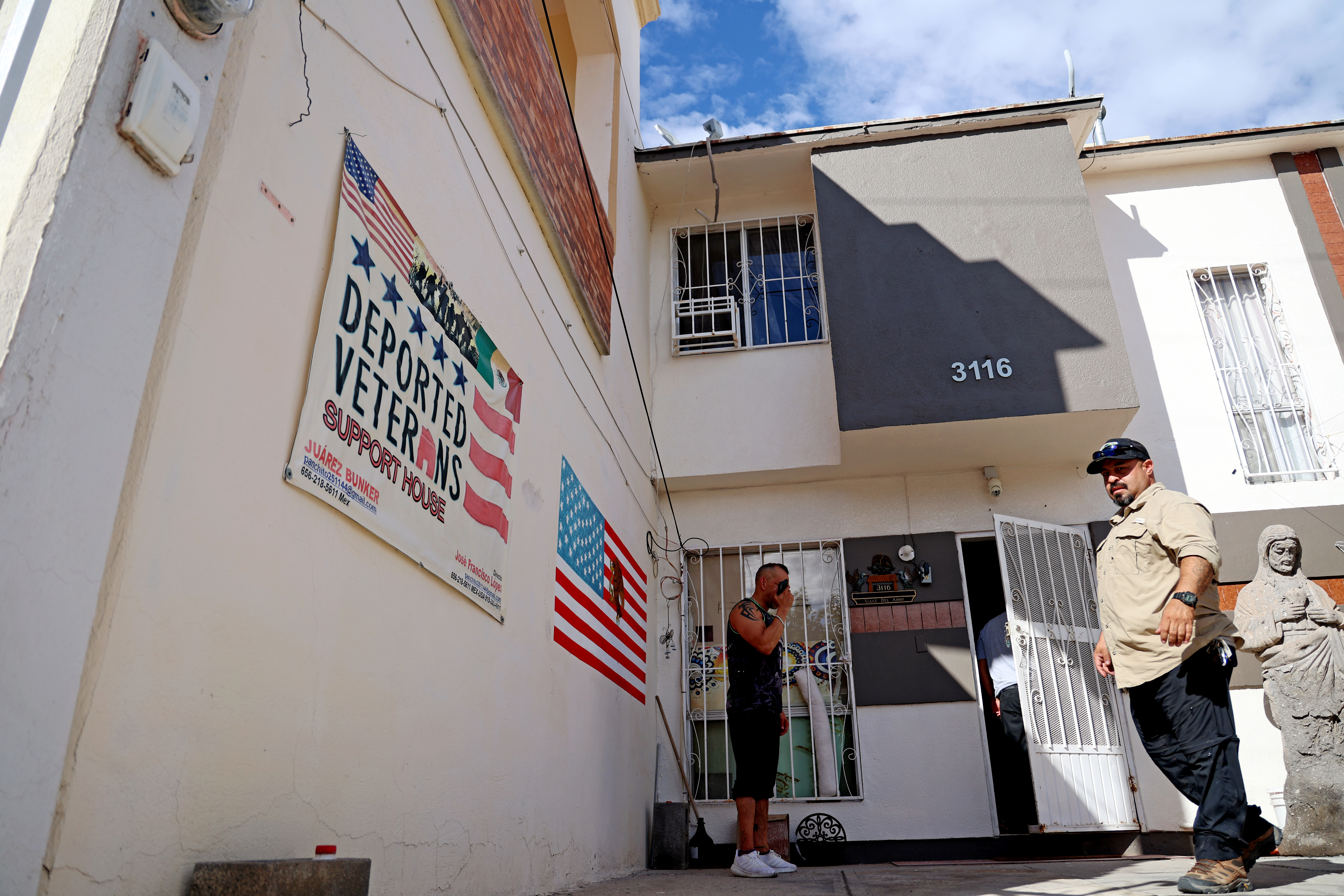 Michael Evans and Pedro Chagoya stand outside.