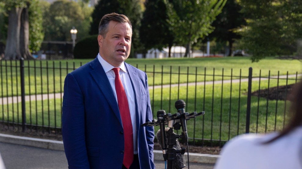 Bill Pulte stands behind a microphone in the White House driveway.