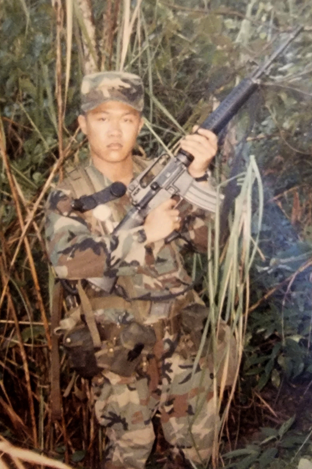 Sae Joon Park holding a gun in Panama during Operation Just Cause.