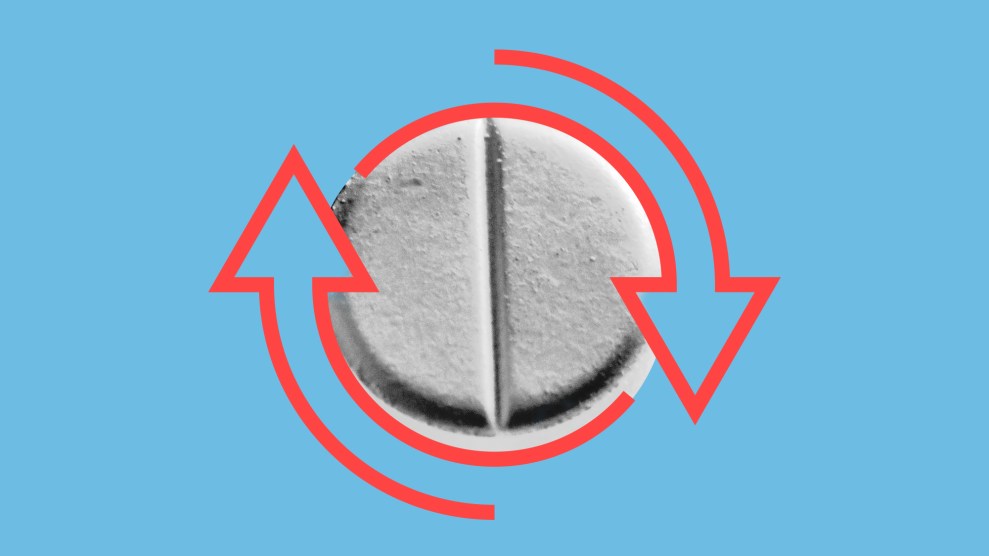 Abortion pill overlaid with two red arrows encircling it, indication a reversal