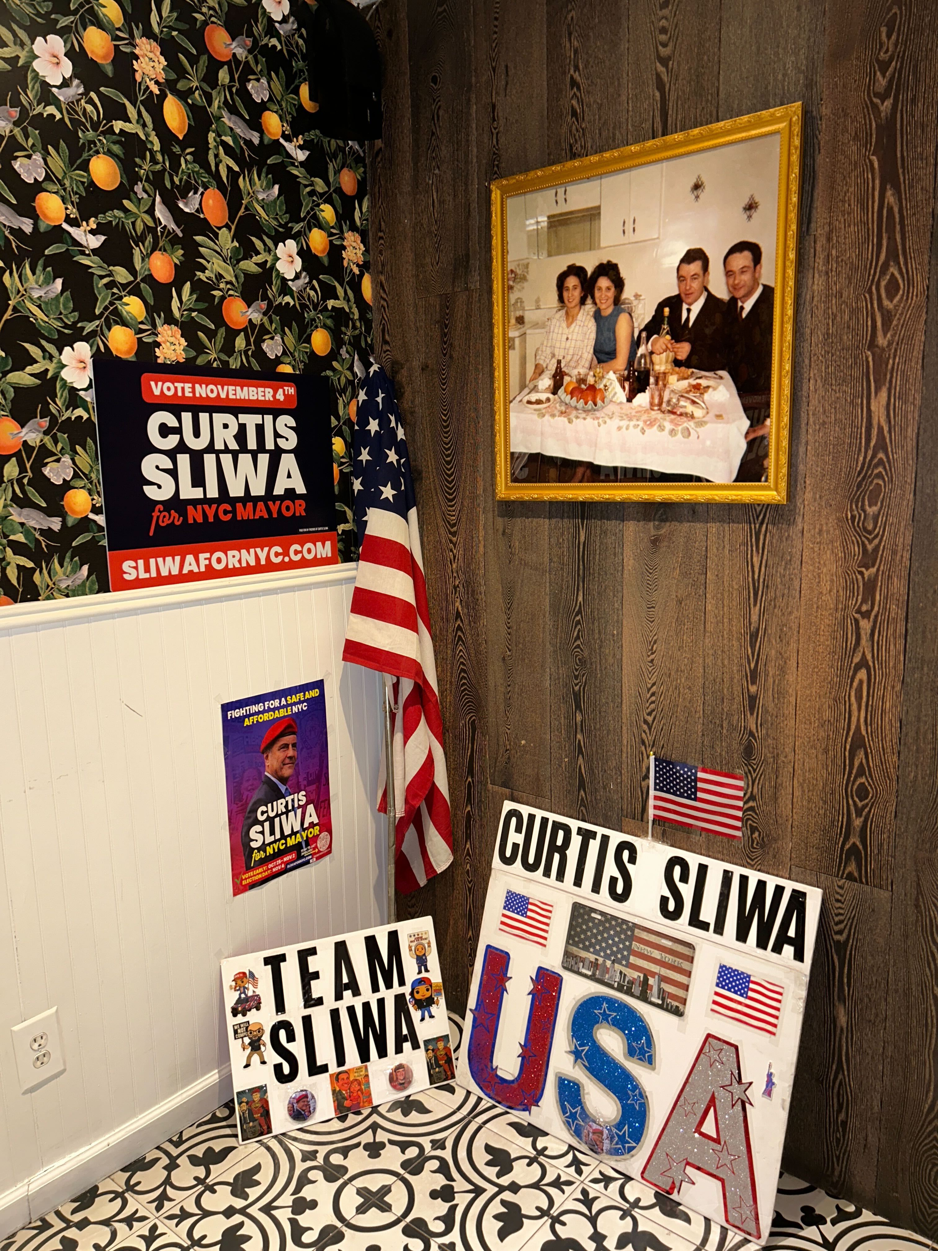 A few campaign signs. Some of which read "Team Sliwa," and "Curtis Sliwa for NYC Mayor."