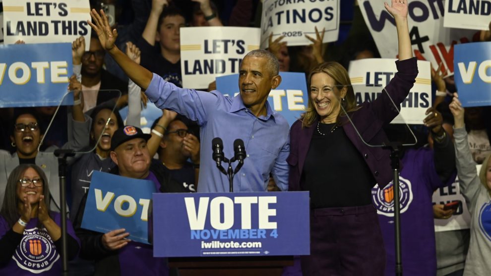 Photo of former president Barack Obama and New Jersey governor candidate Mikie Sherrill at a campaign rally
