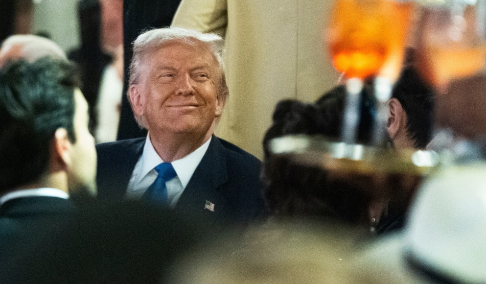 President Donald Trump joins a Mar-a-Lago Halloween party.