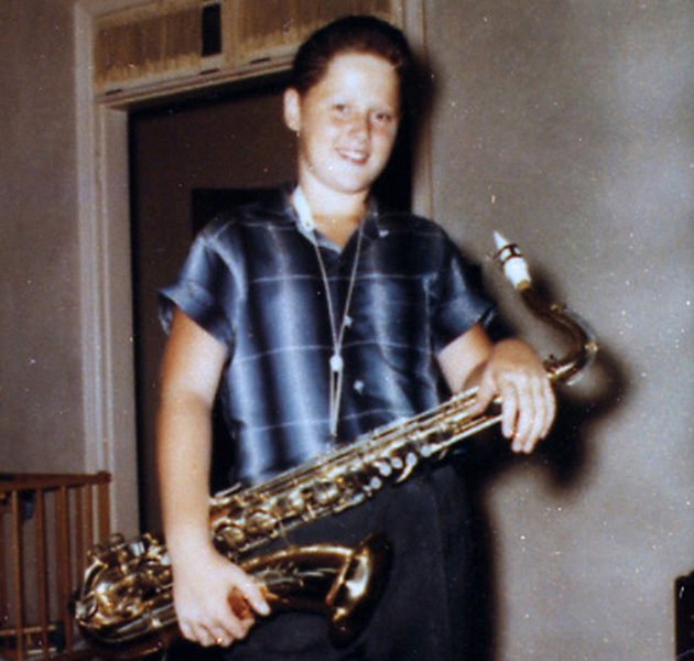 Bill Blythe with a saxophone, celebrating his 12th birthday at his home in Hot Springs, Arkansas, in 1958.