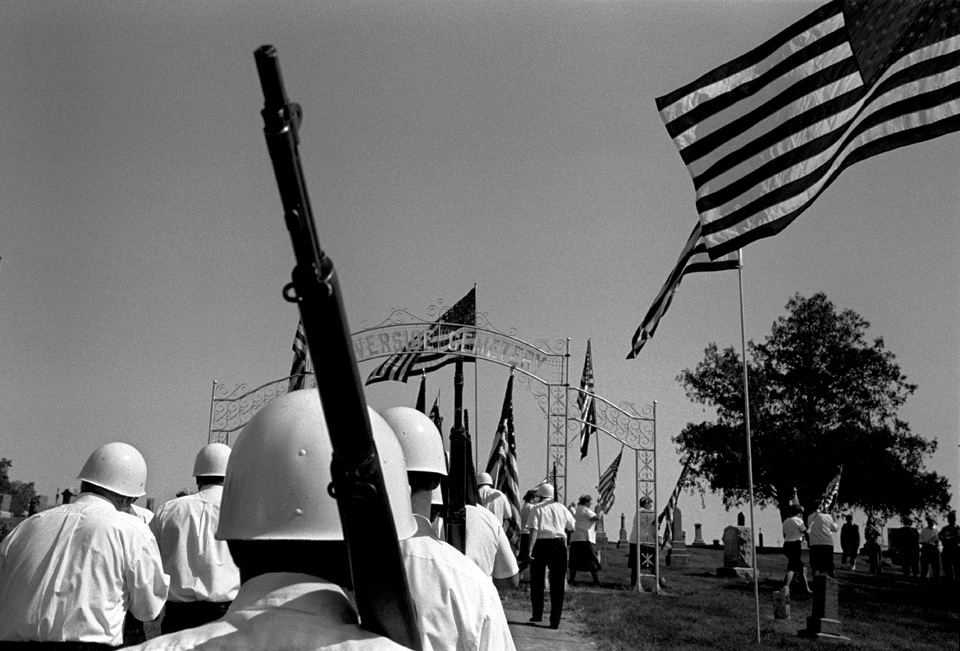 Members of the American Legion march during a Memorial Day service in Riverside, Iowa (2003)